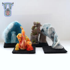 Needlefelted miniatures of elemental creatures. L-R: water, fire, earth & water